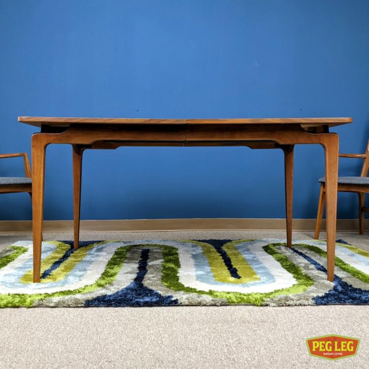 Mid-Century Modern walnut dining table with two large leaves