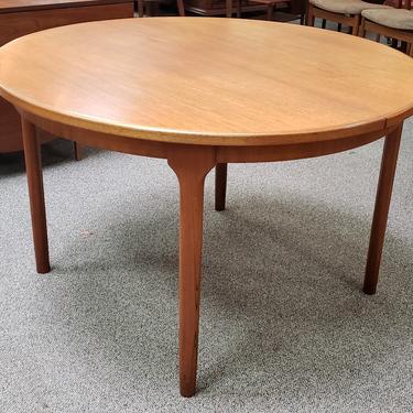 Item #Q15 Vintage Teak Extending Round Dining Table w/ Butterfly Leaf by McIntosh c.1960s