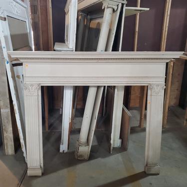White Fireplace Mantel with Pilasters and Trim