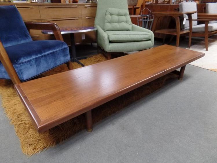 Mid-Century Modern ultra long low walnut coffee table.
