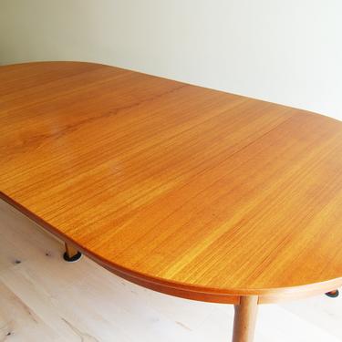 Danish Mid Century Modern Hans Wegner Round Teak and Oak Dining Table With 2 Extensions and Protective Covers by Andrea Tuck 
