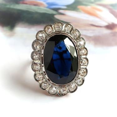 Art Deco 14.05 ct.tw. Midnight Blue Oval Synthetic Sapphire and Diamond Halo Ring 18K Platinum 