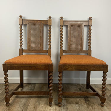Set of 2 Vintage Solid Wood Chairs Hand Carved With Caned Backs 