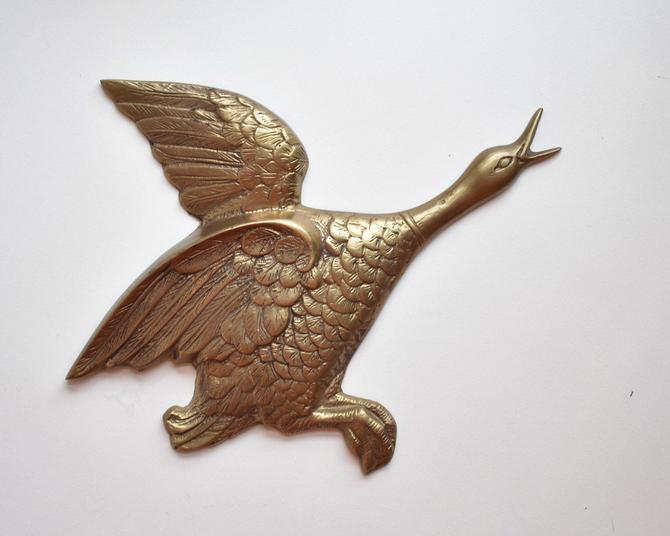 brass flying goose wall dcor made in korea 1980s 1970s boho style scuptural wall hanging metal duck geese bird swan bronze wall art by lostandfoundhandwrks from lost + brass flying goose wall