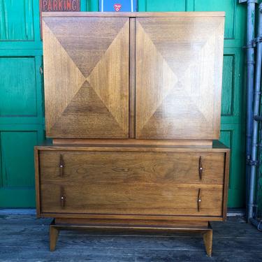 Mid century Highboy dresser with carved wood 