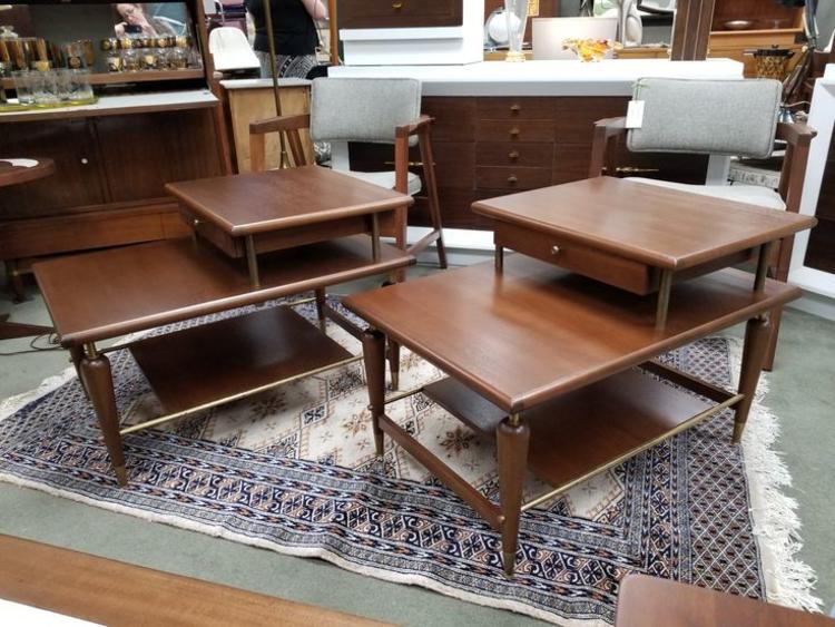 Pair of Mid-Century Modern walnut step tables with brass accents