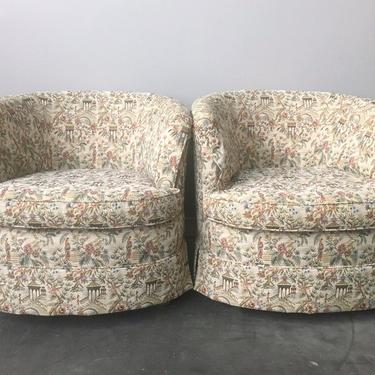 pair of vintage toile barrel chairs.