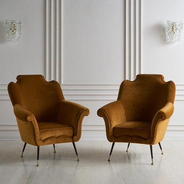 Pair of Italian Mid Century Lounge Chairs in the style of Osvaldo Borsani