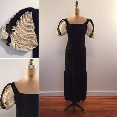 Ana Colon vintage black pleated gown with macrame sleeves 