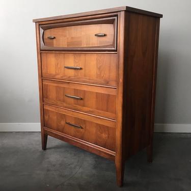 vintage mid century modern highboy dresser with checked wood grain