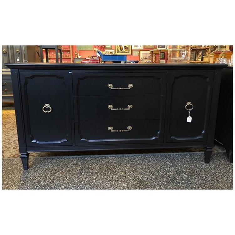 Black painted sideboard/server with dazzling brass knobs. 62” width / 18” deep / 32” height 