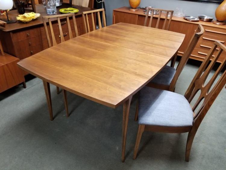Mid-Century Modern walnut boat shape dining table from the Brasilia collection by Broyhill