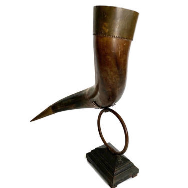 Brass Tipped Horn Mounted on Iron Base 