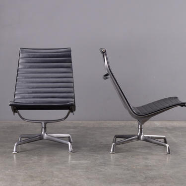 Pair of Eames Aluminum Group Lounge Chairs Black Armless Swivel 