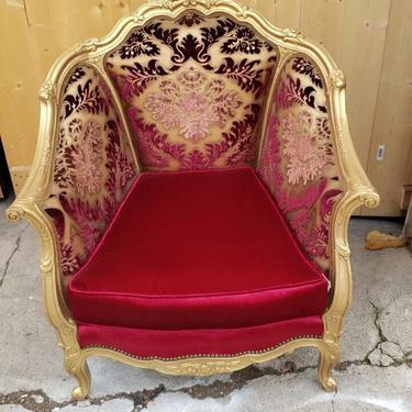 Antique Hand Carved Wingback Armchair Newly Upholstered in Magenta Velvet with Gold Stensil