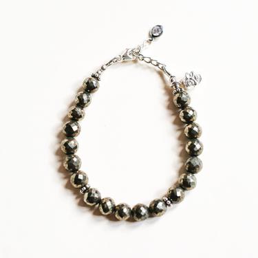 PYRITE BEADED BRACELET WITH STERLING SILVER SKULL CHARM