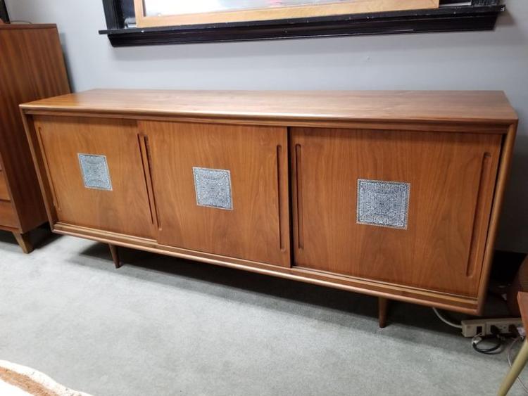                   Mid-Century Modern walnut credenza with ceramic tile inserts in sliding doors