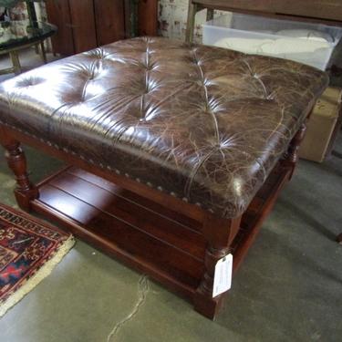 LARGE WOOD AND TUFTED BROWN LEATHER OTTOMAN