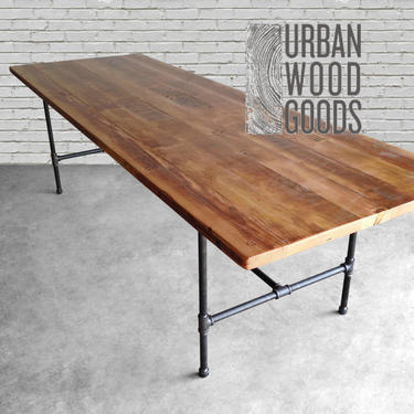 Reclaimed Dining Table with reclaimed wood top and iron pipe legs in choice of sizes or finishes 