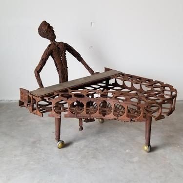 XL- Vintage Outdoor Brutalist Metal Sculpture of a Man on Piano . 