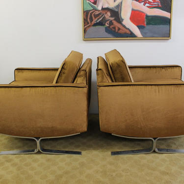 Mid Century Modern pair of club chairs, chocolate velvet and silver legs 