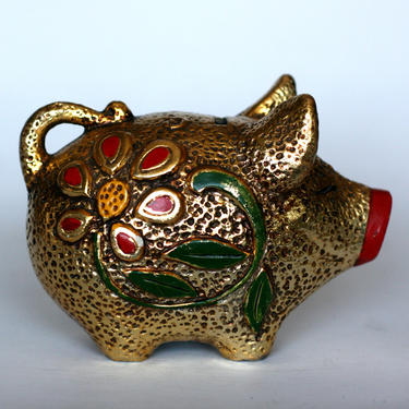 vintage gold ceramic piggy bank with mod floral relief pattern 