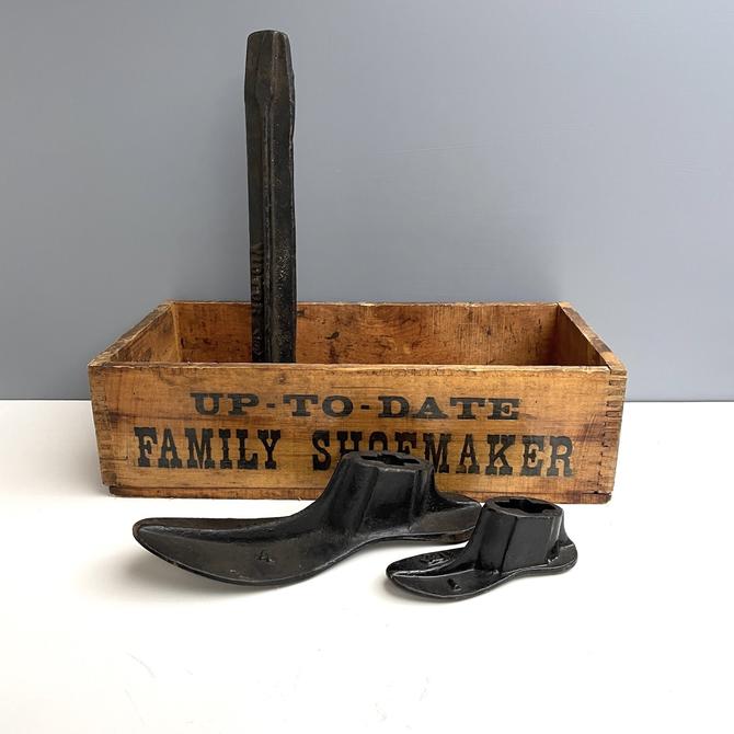 Up-to-Date Family Shoemaker - antique box and iron shoe forms 