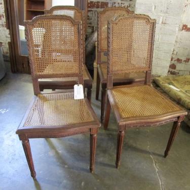 SET OF FOUR FRENCH CANED CHAIRS