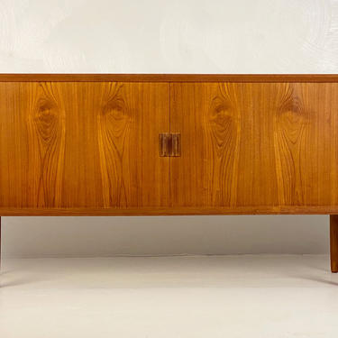Teak Tambour Credenza by Svend Aage Larsen for Faarup Mobelfabrik, Circa 1960s - *Please request a shipping quote before you purchase. 