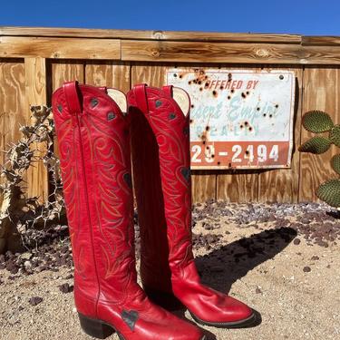 Vintage 1970s red knee high cowboy boots with black hearts and rainbow stitching 