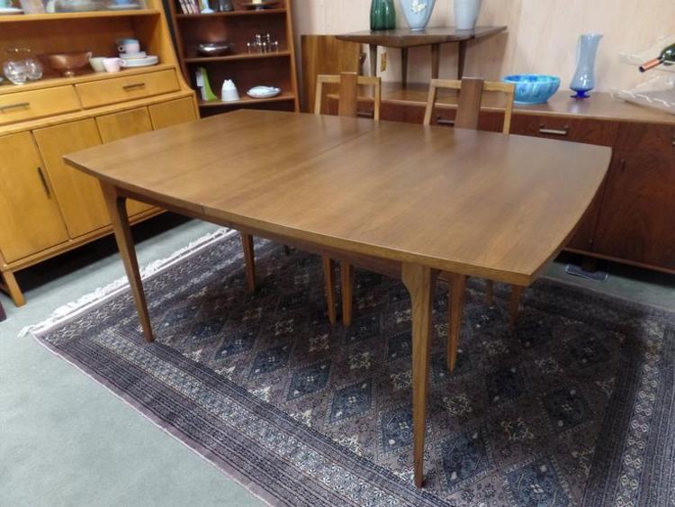 Mid-Century Modern walnut boat shaped dining table for the Brasilia line by Broyhill