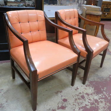 Vintage MCMn pair of Orange Naugahyde chairs