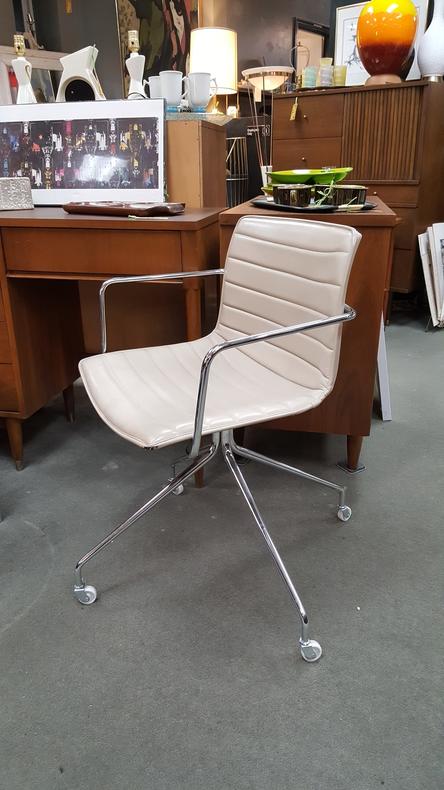 Vintage Eames-style chrome and white vinyl office chair
