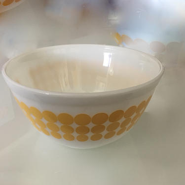 A Vintage Mid Century Glass Pyrex Bowl with Yellow Polka Dot Design 1960's 