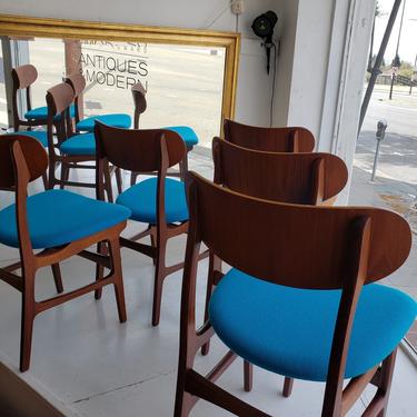 Eight Teak Chairs With Aqua Blue Seats