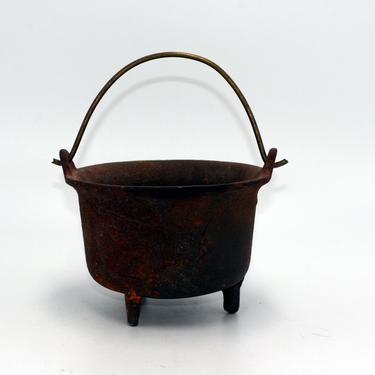 vintage small cast iron footed cauldron 