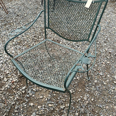 Metal outdoor chairs w/a flower pattern