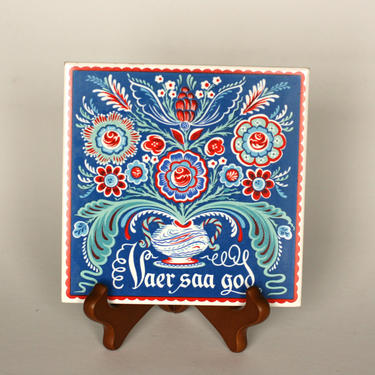 vintage norwegian tile or trivet blue and red ceramic tile 