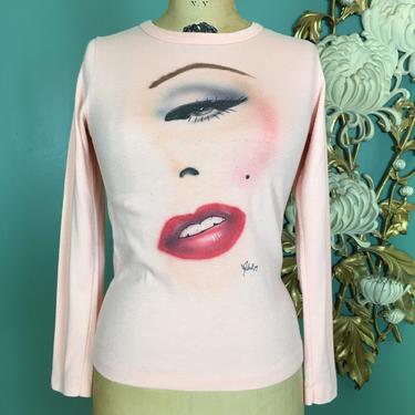 1970s t shirt, novelty print, bombshell, vintage t shirt, peach, fitted tee, long sleeve, air brushed, make up, sexy face, Marilyn, 34 bust 