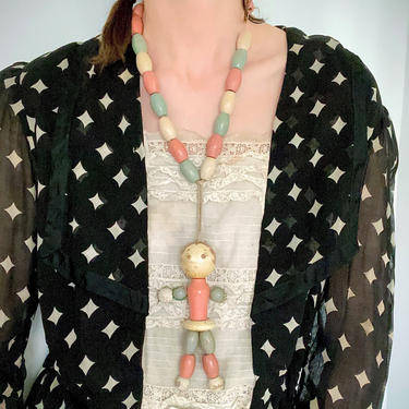 1920s Necklace / 20s Wooden Bead Baby Crib Toy Necklace / Dangling Doll 