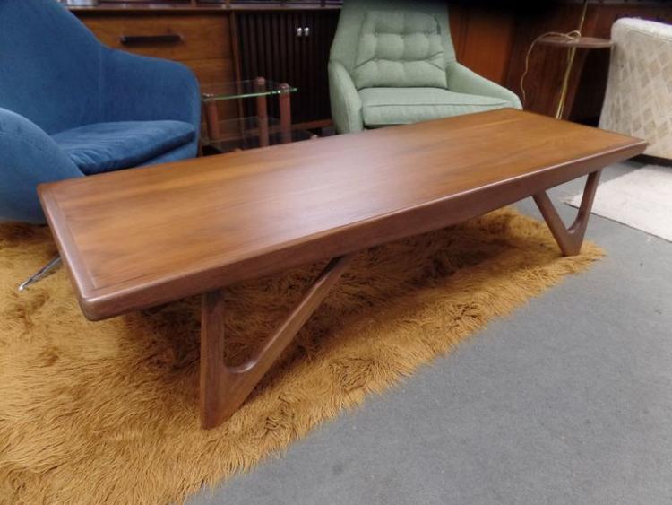 Mid- Century Modern wanut coffee table in the style of Adrian Pearsal