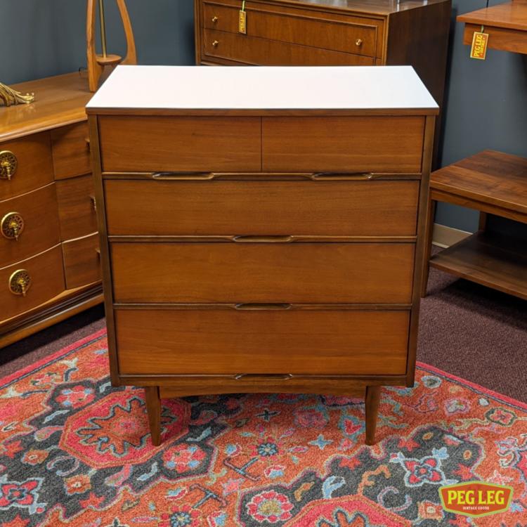 Mid-Century Modern walnut highboy with white laminate top and inset finger pulls