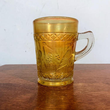 Antique Dugan Glass Carnival Glass Marigold Stork and Rushes Lattice Band Mug 