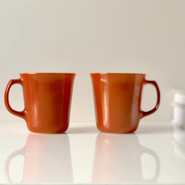 Pair of Burnt Orange Pyrex Coffee Mugs 