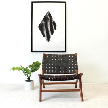 Black Leather Strapped Chair