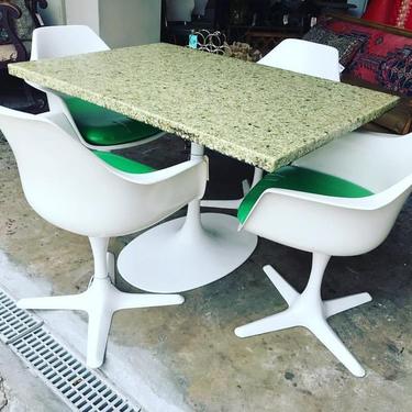 Mid Century resin top table ($275) , together with four Burke Swivels ($300)
