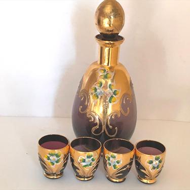 Lovely Vintage Bohemium - Boho-Hand painted Decanter and 4 shot cordial glasses - Gold Overlay Trim and Purple glass and hand painted flower 