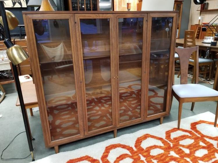                   Mid-Century Modern glass front cabinet