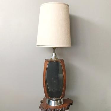vintage mid century sculptural wood + smoked panel lamp.