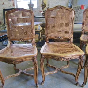 SET OF SIX ANTIQUE FRENCH PROVINCIAL WALNUT CANED CHAIRS